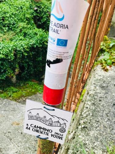 a bottle of antica spray is attached to a pole at Casa vacanza da Berto in Stregna