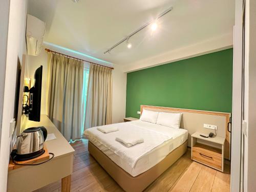 Postel nebo postele na pokoji v ubytování Club Sema Suite Hotel