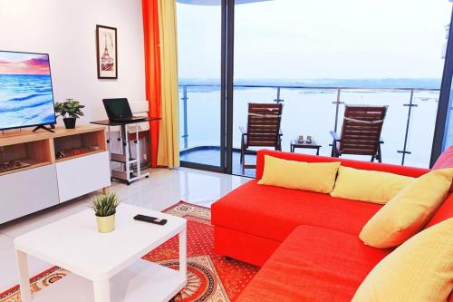 Χώρος καθιστικού στο 海滨度假屋 3BR Condo ~Walk to Beach @13pax #RoyalStrand