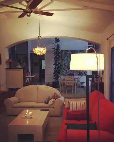 a living room with a couch and a table at Espacio Shangrila.One in Uceda