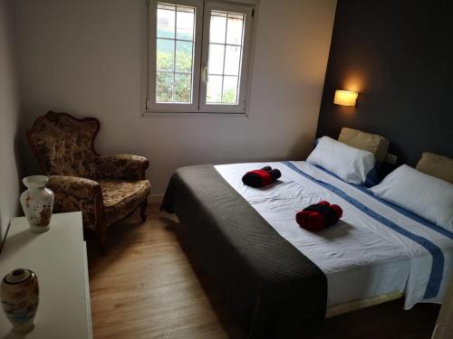 Postel nebo postele na pokoji v ubytování Casa Cosy Yumbo