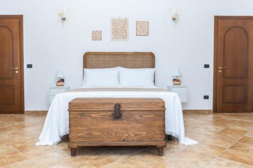 Postel nebo postele na pokoji v ubytování Relais Ruggiero