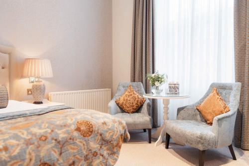 Un ou plusieurs lits dans un hébergement de l'établissement Imperial Hotel Cork City