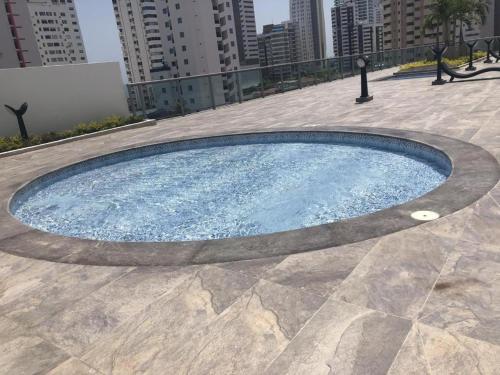 a swimming pool in the middle of a city at Luxury Infinitum in Cartagena de Indias
