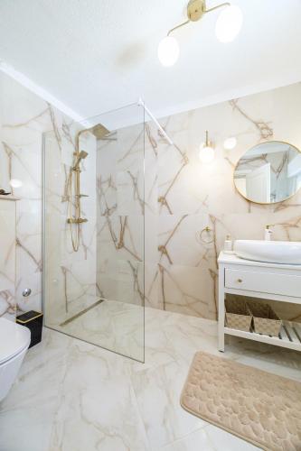 a bathroom with a shower and a sink at Josipa in Supetar