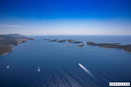an aerial view of a large body of water with boats at Nella Hvar in Rudina