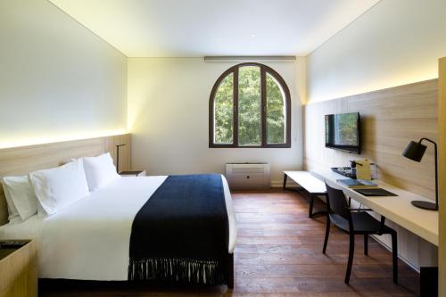 Postel nebo postele na pokoji v ubytování Hotel Altiplanico Bellas Artes