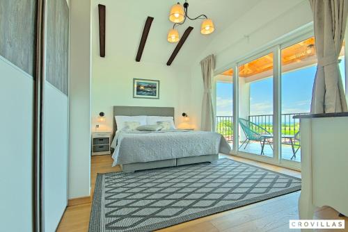 Postel nebo postele na pokoji v ubytování Vespera