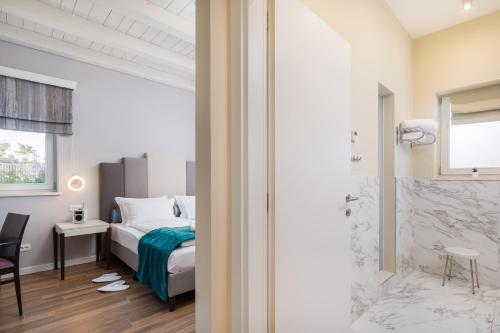 Postel nebo postele na pokoji v ubytování Design Sole