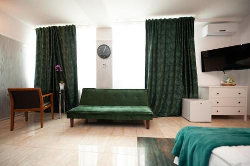 Ένα ή περισσότερα κρεβάτια σε δωμάτιο στο SIA Residence