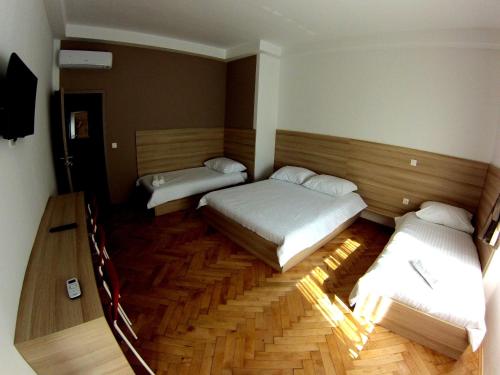 Postel nebo postele na pokoji v ubytování Sweet Dreams Rooms and Apartments Postojna