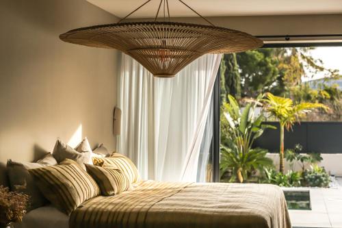 Katil atau katil-katil dalam bilik di Suites 23