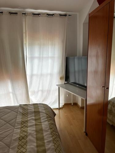 Een bed of bedden in een kamer bij Chalet adosado, 3 habitaciones