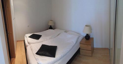 Cama o camas de una habitación en Caze Reykjavik Central Luxury Apartments