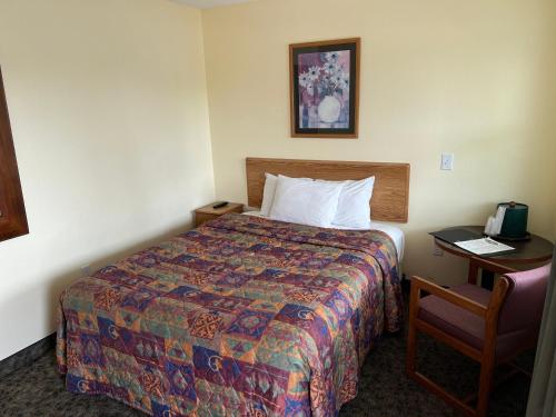 Katil atau katil-katil dalam bilik di All Star Inn & Suites