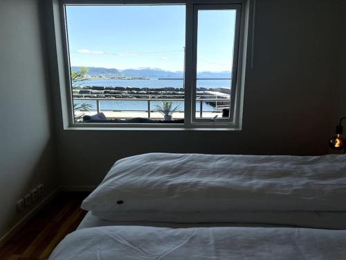 Postel nebo postele na pokoji v ubytování Seaside Central Apartment