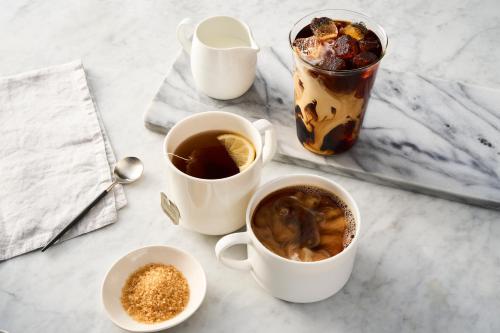 a table with two cups of coffee and a drink at Residence Inn by Marriott Abilene in Abilene