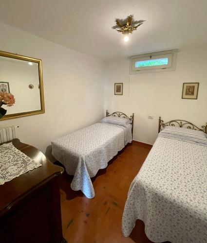 Ένα ή περισσότερα κρεβάτια σε δωμάτιο στο Villa Filippo