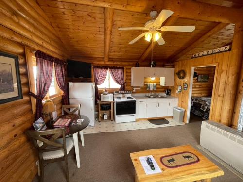 an overhead view of a kitchen with a ceiling fan at Sportsman Lodge Melrose MT in Melrose
