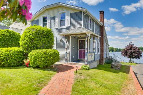 a house with a brick walkway leading to the front door at Lakefront Home, Close to Mt Southington! in Wolcott