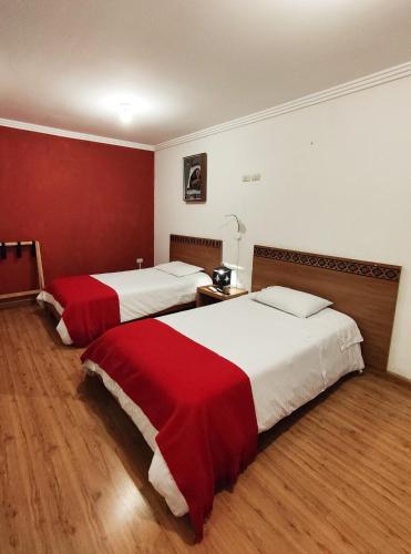 Postel nebo postele na pokoji v ubytování Komodo B&B
