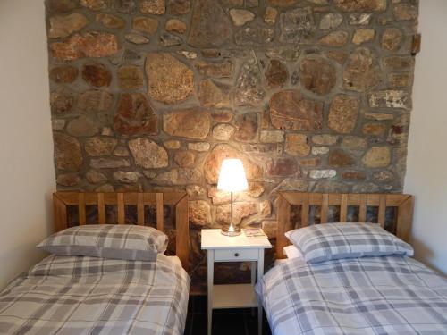 Кровать или кровати в номере Whitewell Barn