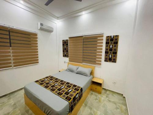 Łóżko lub łóżka w pokoju w obiekcie Appartement T 2 : Résidence LES 11 PLURIELLES