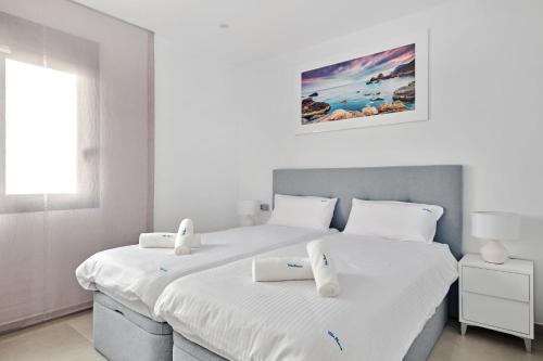 En eller flere senge i et værelse på Villa Blanco with private pool