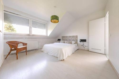 Ένα ή περισσότερα κρεβάτια σε δωμάτιο στο Neue Wohnung in der Nähe von Trier