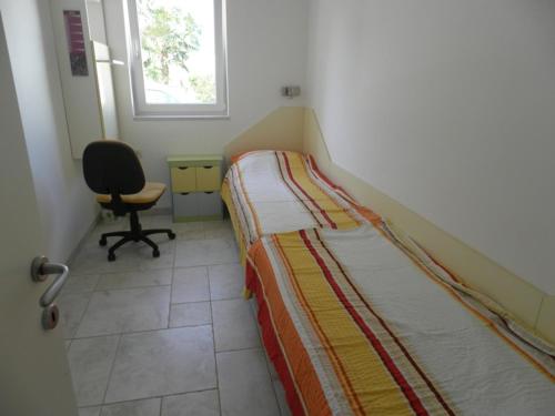 Ένα ή περισσότερα κρεβάτια σε δωμάτιο στο Ajda apartment on the beach