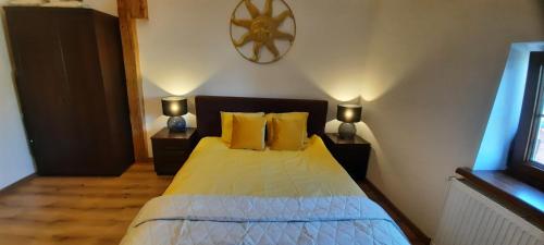 Postel nebo postele na pokoji v ubytování Komfortowy Apartament w Młynie Mrągowo