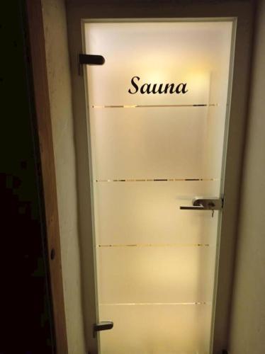 a door with the word savina written on it at Chalupa Bocza in Nižná Boca