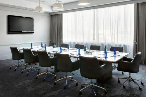 a conference room with a long table and chairs at Philadelphia Airport Marriott in Philadelphia