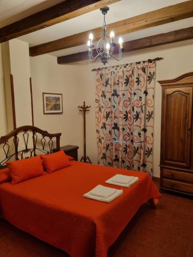 Postel nebo postele na pokoji v ubytování La Casa de Tio Claudio