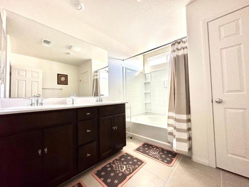 a bathroom with a sink and a shower at NEW House, 2023 built, 5 bedrooms, Sleeps 12, Near Las Vegas Strip and Airport in Las Vegas