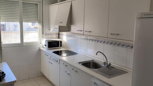 Kuchyň nebo kuchyňský kout v ubytování Duplex en el Centro de Huelva
