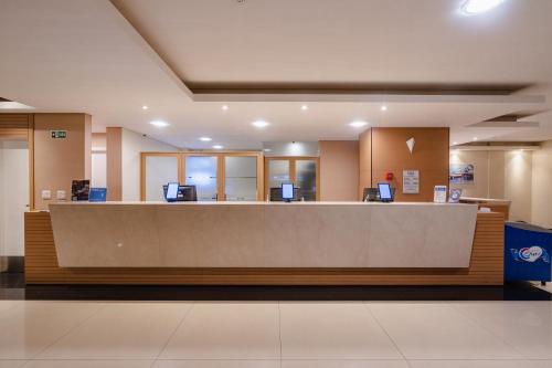 Hotel Caiuá Expressのロビーまたはフロント