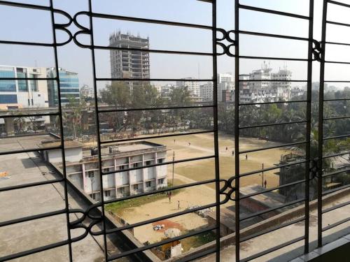 a view of a city from a window at Spacious Penthouse in heart of city. By GEC circle in Chittagong