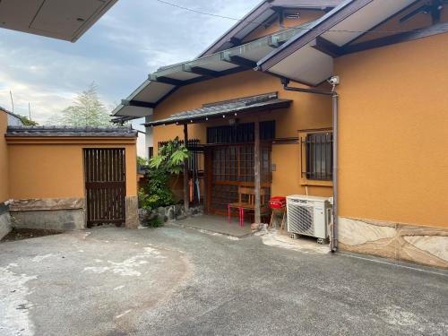 a house with an open door with a heater at ヴィラマーレ熱海（Villa Mare Atami） in Atami
