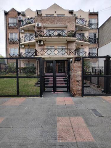 an external view of a building with a door at Bienestar Haedo in Mariano J. Haedo