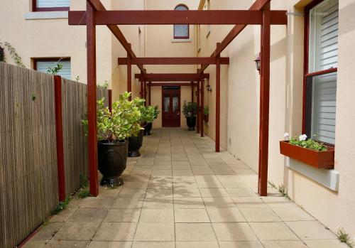 a hallway of a house with a wooden at Ozone Tower in Queenscliff