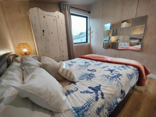 Ένα ή περισσότερα κρεβάτια σε δωμάτιο στο Vitamin Sea Beach House