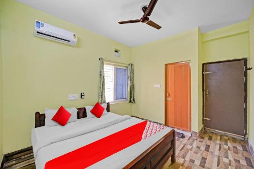 Cama o camas de una habitación en Flagship Hotel Sunlight Premium Guest House