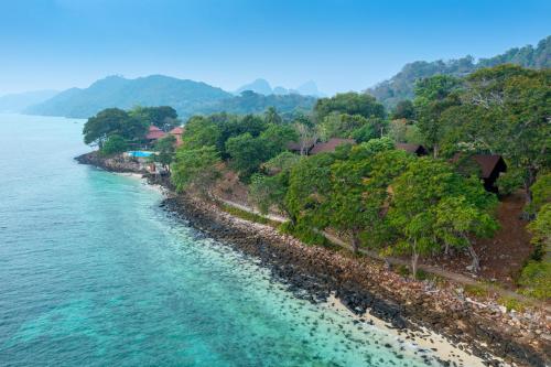 an aerial view of a beach and the ocean at Phi Phi Natural Resort in Phi Phi Don