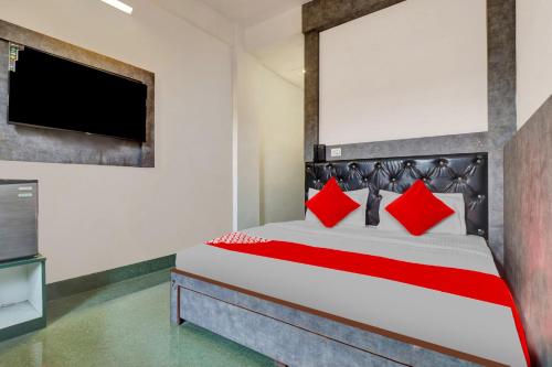 Voodi või voodid majutusasutuse Flagship Hotel Holiday Inn toas