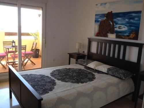 Cama o camas de una habitación en Jumilla III