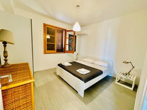 Ένα ή περισσότερα κρεβάτια σε δωμάτιο στο Villa Sicily, gorgeous villas with Private Pool, near Cefalu'