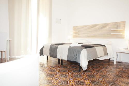 Postel nebo postele na pokoji v ubytování B&B Barone Sieri Pepoli