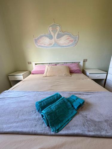 Cama ou camas em um quarto em Sea View - Cozy apartment with parking space