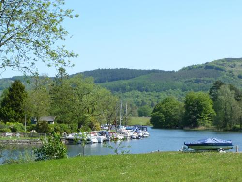 a bunch of boats are docked at a marina at Cherry in Ulverston